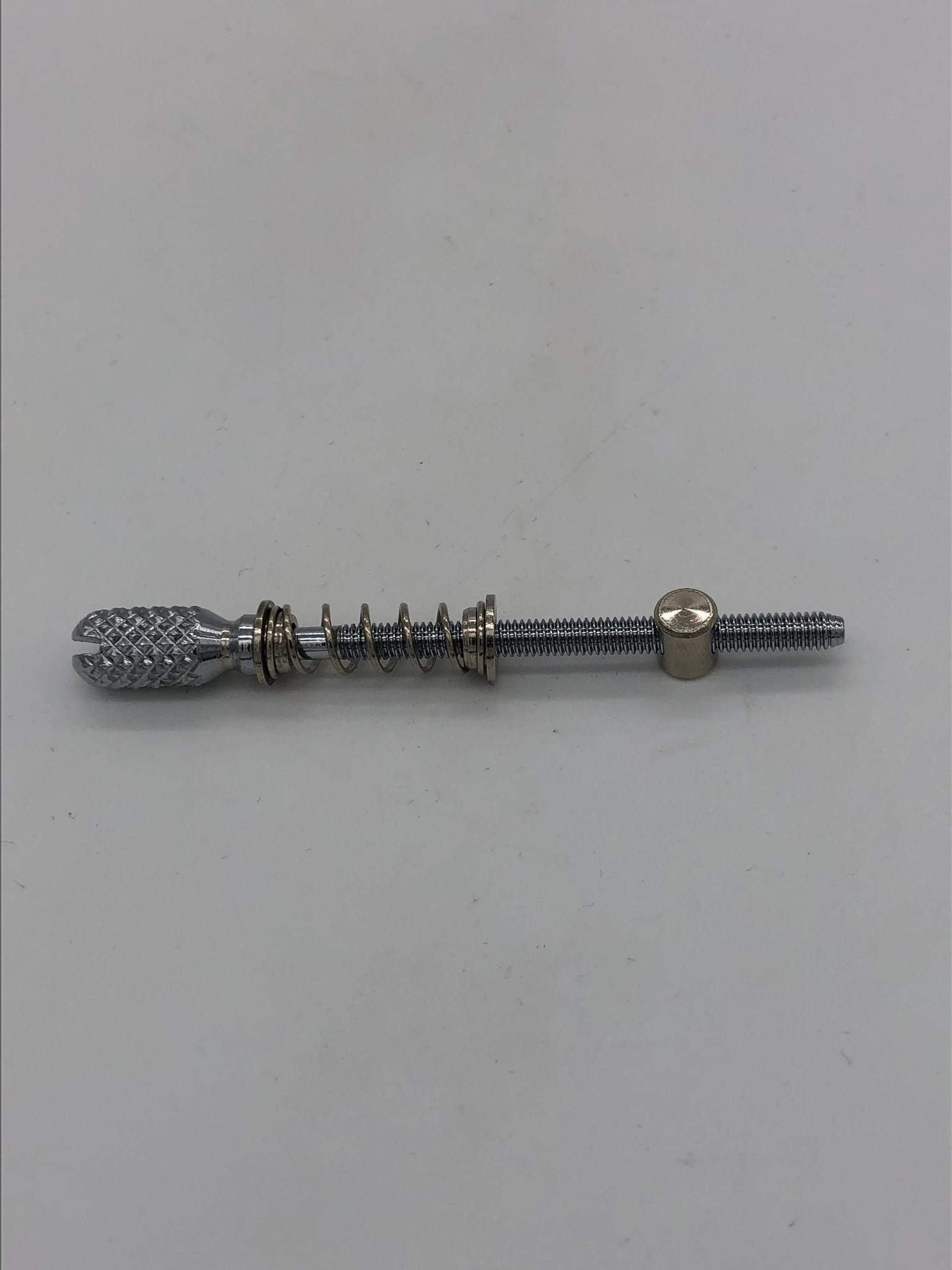 STRAINING SCREW WITH NUT AND SPRING